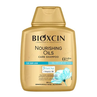 شامپو ضد ریزش بیوکسین Nourishing Oils حجم 300 میل، مناسب برای تقویت ریشه مو، کاهش ریزش و آبرسانی پوست سر.